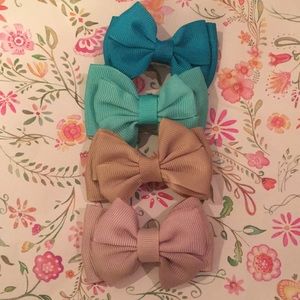 Milan’s soft pastel colored hair bows